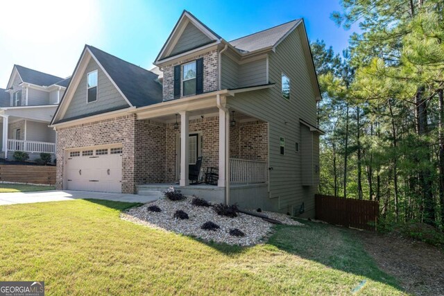 6424 Barker Station Walk, Sugar Hill, GA 30518 - view of front of property featuring a porch, brick siding, driveway, and a garage