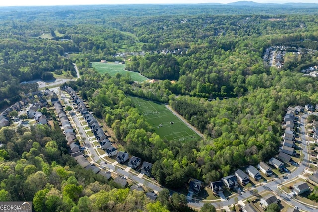 6424 Barker Station Walk, Sugar Hill, GA 30518 - aerial view of property's location with a heavily wooded area