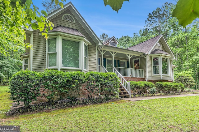 469 Kimberly Ct, Mcdonough, GA 30252 - view of front of home with a front yard, covered porch, and stairway