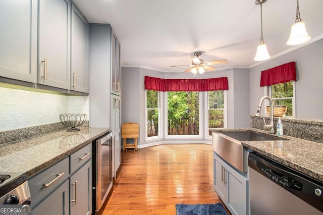 469 Kimberly Ct, Mcdonough, GA 30252 - kitchen featuring stainless steel dishwasher, gray cabinets, wine cooler, light wood finished floors, and ornamental molding