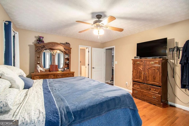 469 Kimberly Ct, Mcdonough, GA 30252 - bedroom featuring light wood-type flooring and a ceiling fan