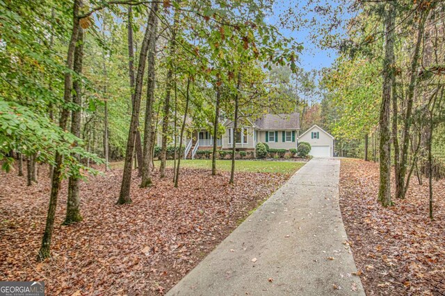 469 Kimberly Ct, Mcdonough, GA 30252 - view of front of house featuring concrete driveway and a garage