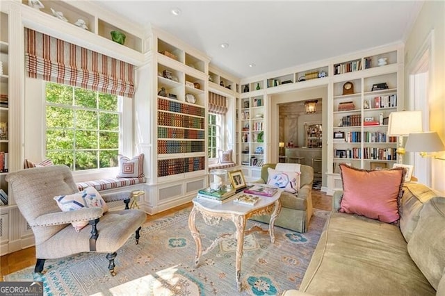 sitting room with built in shelves