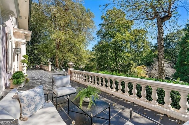 balcony featuring a patio area