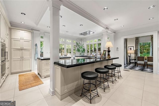 bar featuring crown molding, light tile patterned floors, a wealth of natural light, and recessed lighting