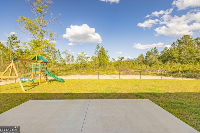 view of yard featuring playground community