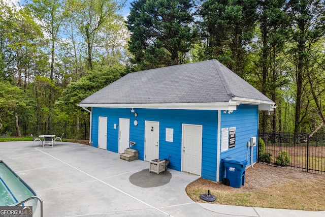 garage with fence