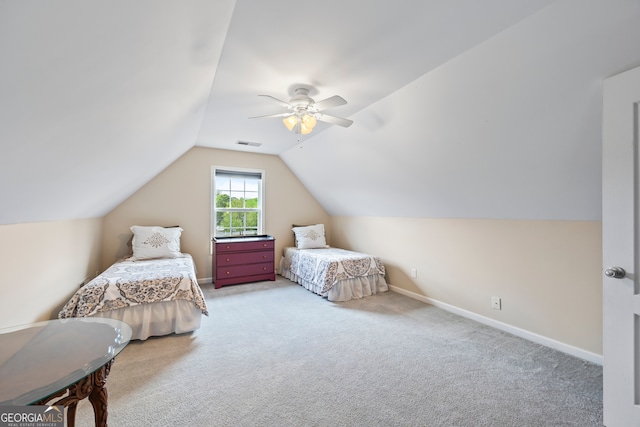 carpeted bedroom with visible vents, baseboards, a ceiling fan, and lofted ceiling