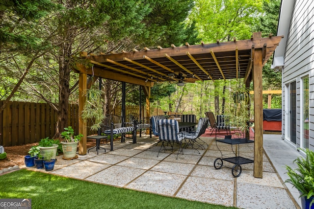 view of patio featuring outdoor dining space, a pergola, and fence