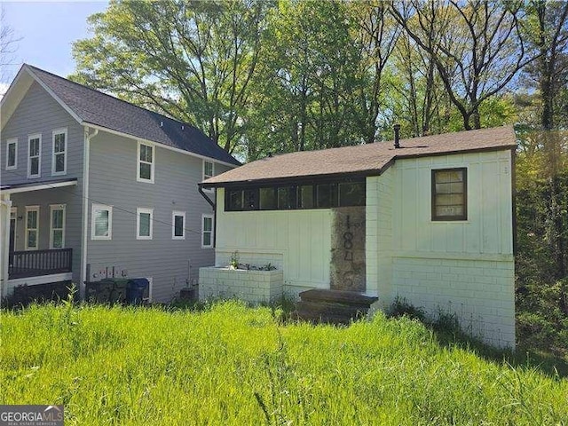 1846 Markone St NW, Atlanta, GA 30318 - rear view of property featuring board and batten siding