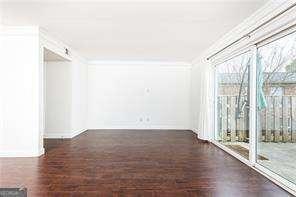 5672 Kingsport Dr Unit 4, Atlanta, GA 30342 - hall with wood finished floors