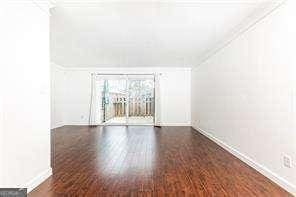 5672 Kingsport Dr Unit 4, Atlanta, GA 30342 - bonus room with wood finished floors and vaulted ceiling