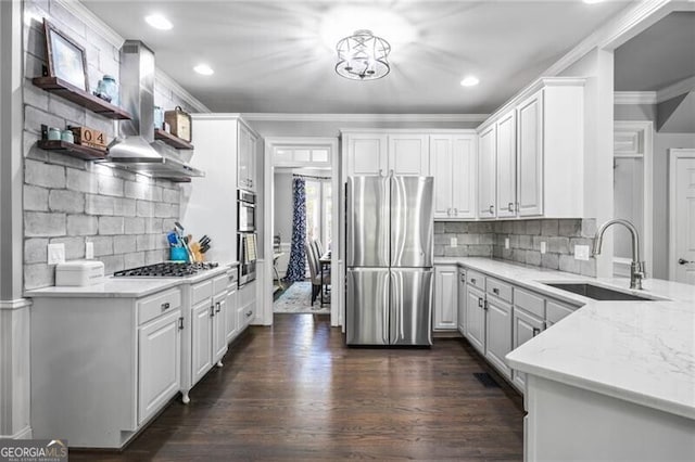1326 Benbrooke Ln NW, Acworth, GA 30101 - kitchen featuring crown molding, wall chimney exhaust hood, open shelves, appliances with stainless steel finishes, and a sink