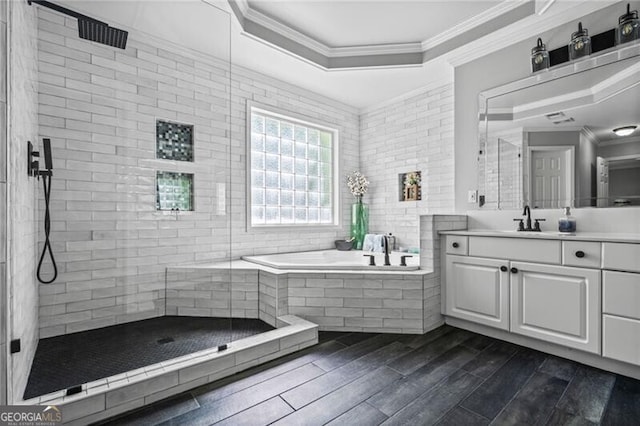 1326 Benbrooke Ln NW, Acworth, GA 30101 - full bath with a raised ceiling, ornamental molding, a tile shower, vanity, and wood finished floors