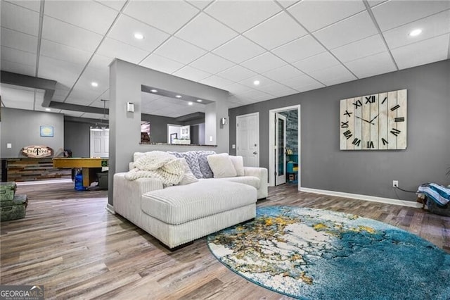 1326 Benbrooke Ln NW, Acworth, GA 30101 - living room with wood finished floors, baseboards, a drop ceiling, and recessed lighting