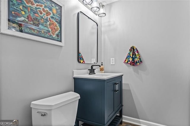 1326 Benbrooke Ln NW, Acworth, GA 30101 - half bath featuring toilet, vanity, and baseboards