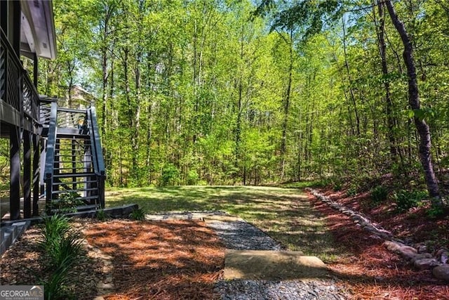 1326 Benbrooke Ln NW, Acworth, GA 30101 - view of yard with a wooded view and stairs