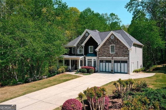 1326 Benbrooke Ln NW, Acworth, GA 30101 - craftsman-style house featuring a front lawn, stone siding, a garage, and concrete driveway
