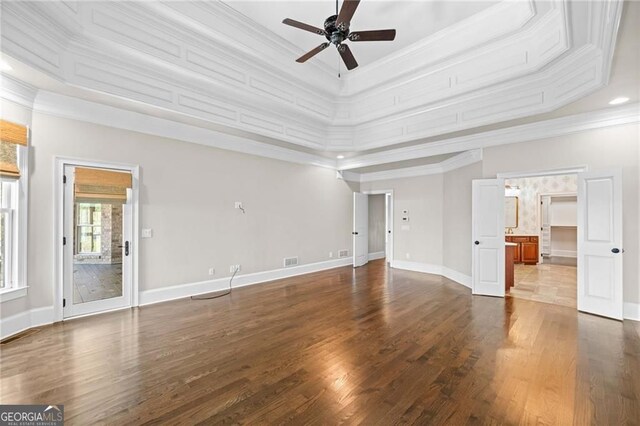 411 River Bluff Ln, Ball Ground, GA 30107 - unfurnished living room featuring wood finished floors, baseboards, crown molding, and ceiling fan