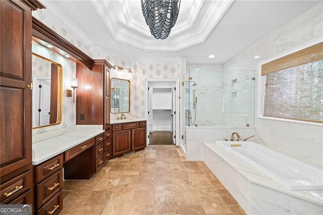 411 River Bluff Ln, Ball Ground, GA 30107 - full bath with a bath, a raised ceiling, an inviting chandelier, crown molding, and a shower stall