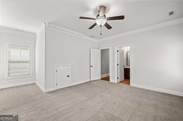 411 River Bluff Ln, Ball Ground, GA 30107 - unfurnished bedroom featuring ornamental molding, carpet, and visible vents
