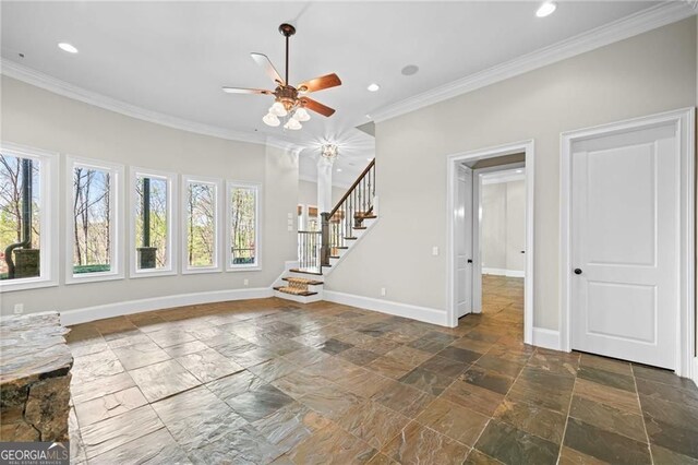411 River Bluff Ln, Ball Ground, GA 30107 - unfurnished living room featuring stairs, baseboards, crown molding, and stone tile flooring