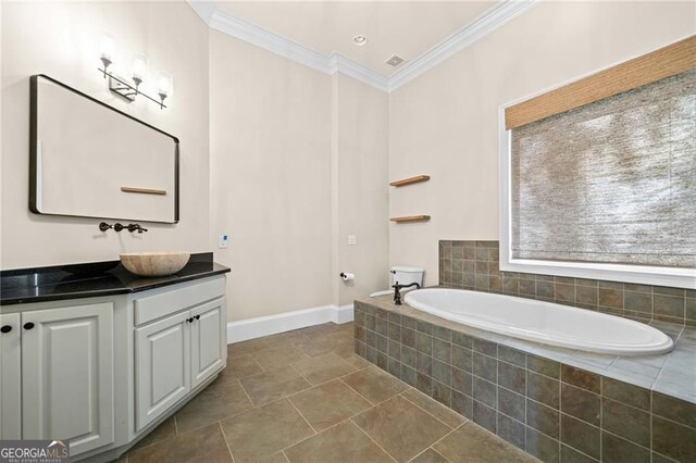 411 River Bluff Ln, Ball Ground, GA 30107 - bathroom featuring crown molding, a bath, vanity, and baseboards