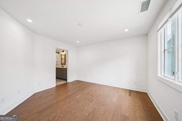 135 Channing Ln, Fayetteville, GA 30214 - empty room with wood finished floors and recessed lighting