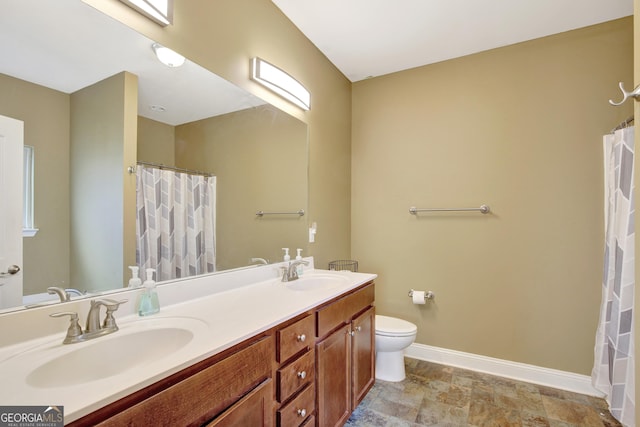 890 Crescent Ln, Griffin, GA 30224 - bathroom featuring double vanity, stone finish flooring, and a shower with curtain
