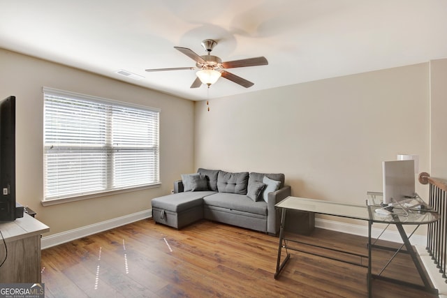 890 Crescent Ln, Griffin, GA 30224 - living area with ceiling fan and wood finished floors
