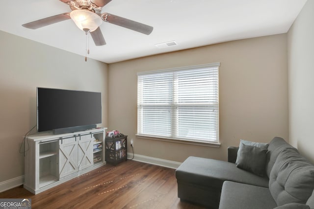 890 Crescent Ln, Griffin, GA 30224 - living room featuring dark wood-style floors and ceiling fan