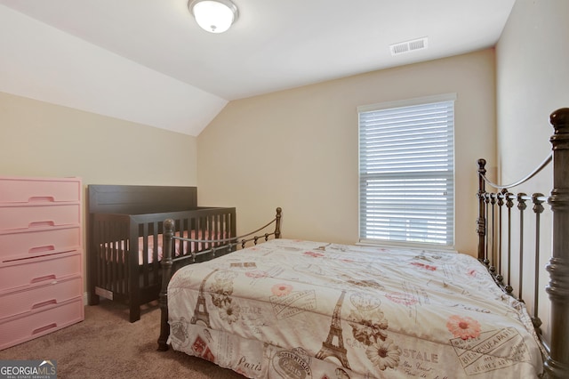 890 Crescent Ln, Griffin, GA 30224 - bedroom featuring carpet flooring, multiple windows, and vaulted ceiling