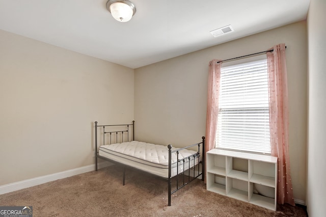 890 Crescent Ln, Griffin, GA 30224 - bedroom with carpet floors and baseboards