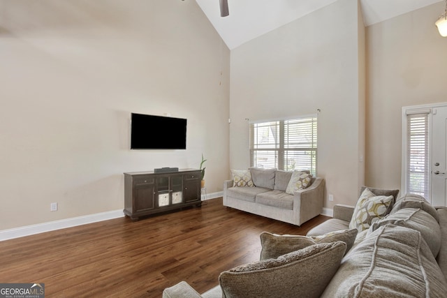 890 Crescent Ln, Griffin, GA 30224 - living room with high vaulted ceiling, ceiling fan, healthy amount of natural light, and dark wood finished floors
