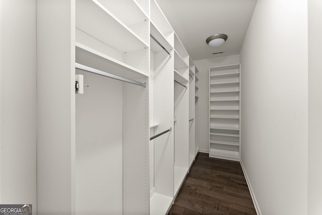 763 Hamilton Cir SE, Atlanta, GA 30312 - spacious closet with dark wood-style floors and visible vents
