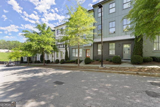 763 Hamilton Cir SE, Atlanta, GA 30312 - view of front of home with brick siding and board and batten siding