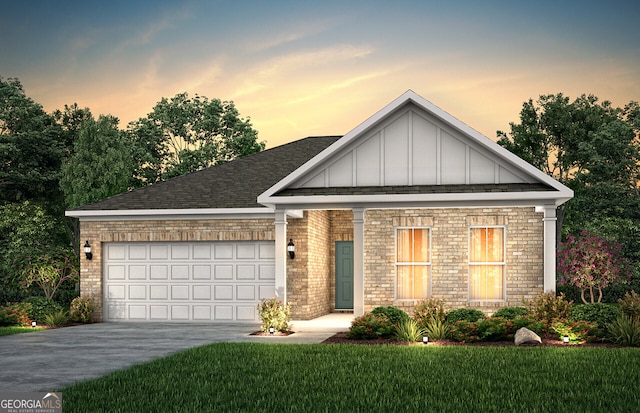 2108 Amaryllis Dr, Grayson, GA 30017 - view of front facade featuring board and batten siding, driveway, a yard, and brick siding