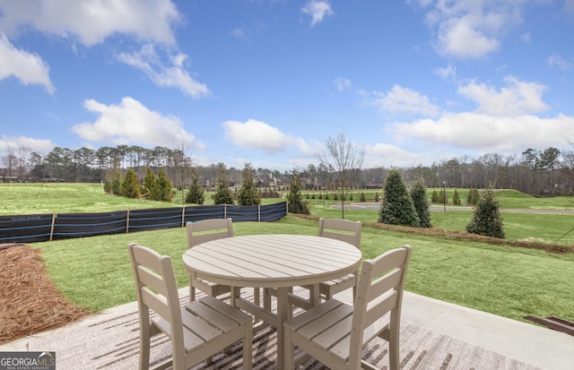 2108 Amaryllis Dr, Grayson, GA 30017 - view of patio / terrace with outdoor dining area and fence