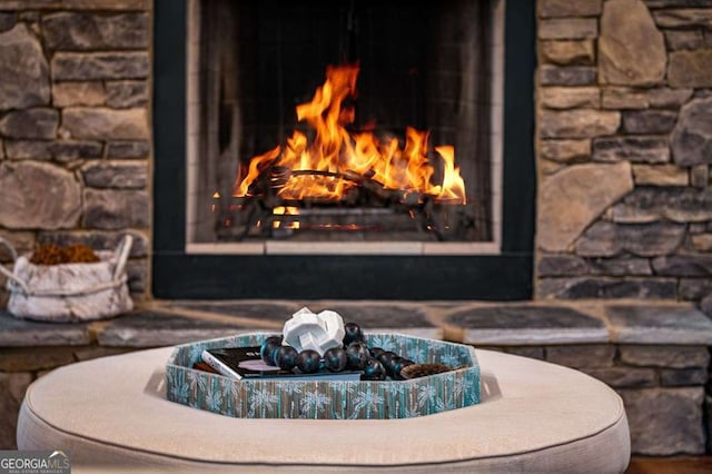 details featuring a brick fireplace