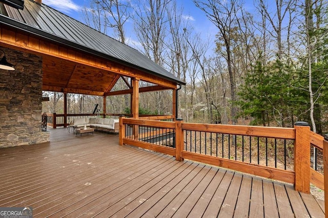 deck featuring outdoor lounge area