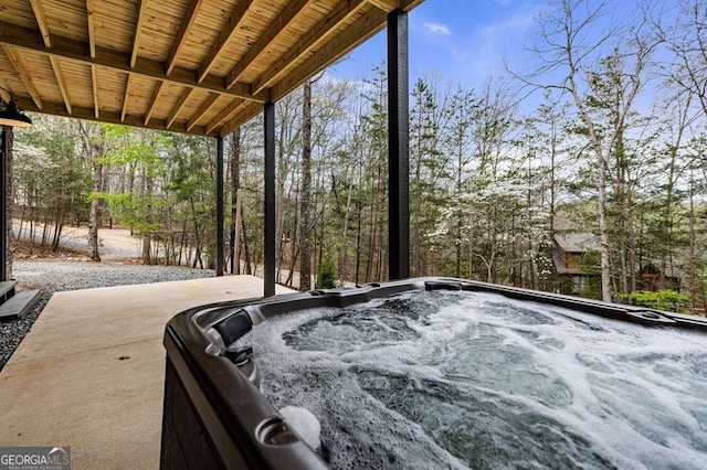 view of patio featuring a hot tub