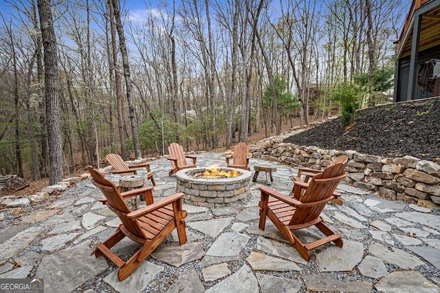 view of patio / terrace with an outdoor fire pit