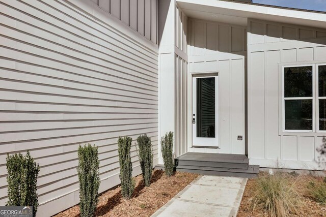 290 Hodgson Dr, Athens, GA 30606 - view of exterior entry with board and batten siding