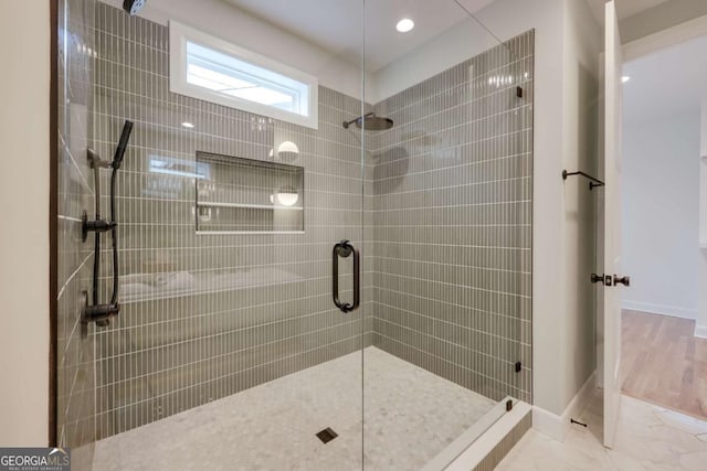 290 Hodgson Dr, Athens, GA 30606 - bathroom with tiled shower, baseboards, and recessed lighting