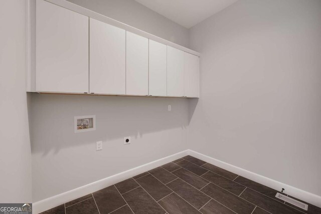 290 Hodgson Dr, Athens, GA 30606 - washroom with visible vents, hookup for an electric dryer, washer hookup, baseboards, and cabinet space