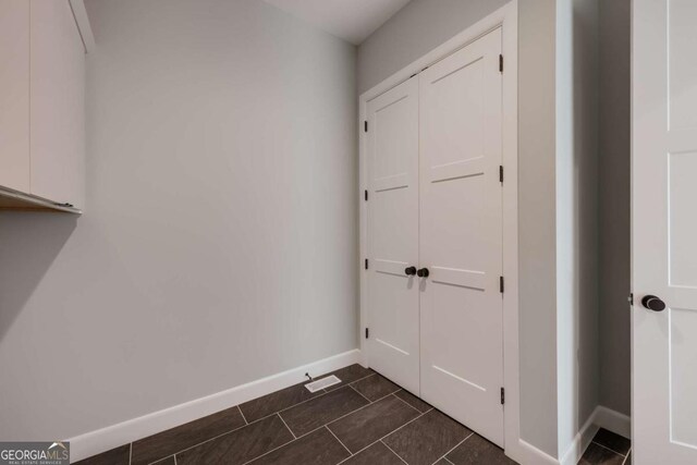 290 Hodgson Dr, Athens, GA 30606 - doorway to outside with dark tile patterned flooring and baseboards