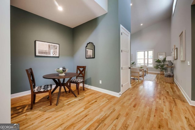 290 Hodgson Dr, Athens, GA 30606 - dining room with high vaulted ceiling, light wood-type flooring, and baseboards