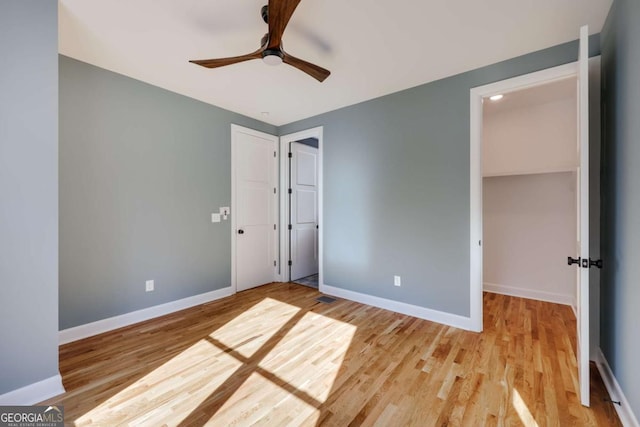 290 Hodgson Dr, Athens, GA 30606 - unfurnished bedroom with a closet, baseboards, visible vents, ceiling fan, and light wood finished floors