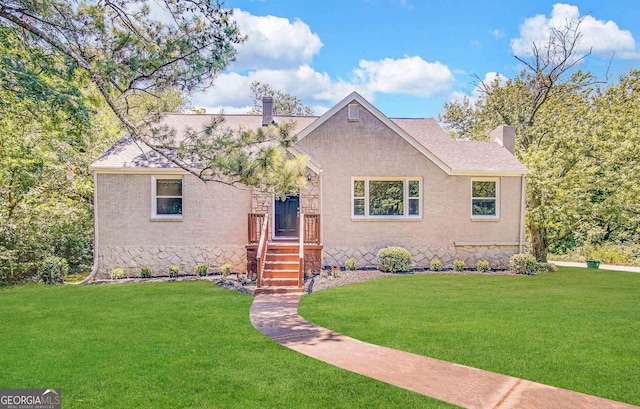 2361 Whites Mill Rd, Decatur, GA 30032 - single story home with a front yard, brick siding, and a chimney