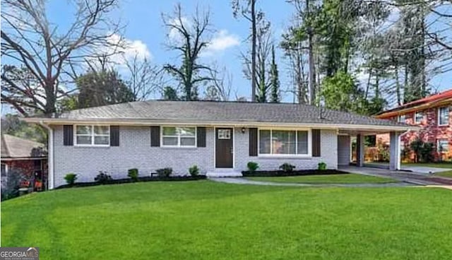 3191 Gay Dr, Decatur, GA 30032 - ranch-style home featuring a front yard, an attached carport, and aphalt driveway